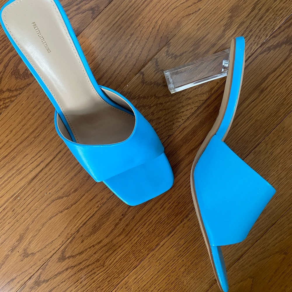 Vibrant blue clear heeled sandals